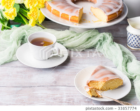 Bundt cake with frosting. Easter festive dessert Bundt cake with frosting. Easter festive dessert 33857774