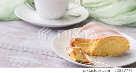 Bundt cake with frosting. Easter festive dessert Bundt cake with frosting. Easter festive dessert 33857775