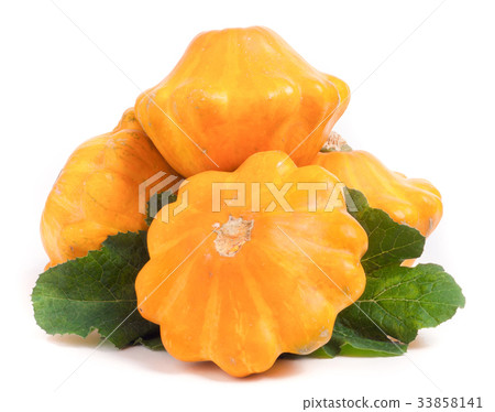 four yellow pattypan squash with leaf isolated on 33858141