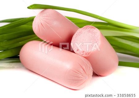 three sausages with spring onions isolated on three sausages with spring onions isolated on 33858655