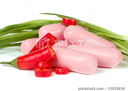 sausages with green onions and chilli isolated on sausages with green onions and chilli isolated on 33858656