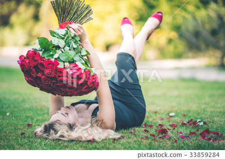 Elegant beautiful blonde woman is wearing black 33859284