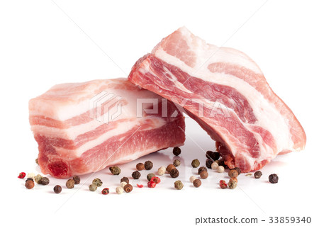 pieces of pork with peppercorn isolated on white pieces of pork with peppercorn isolated on white 33859340