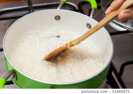Rice Pudding with cinnamon and raisins preparation Rice Pudding with cinnamon and raisins preparation 33860875