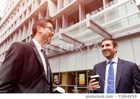 Two businessmen talking outdoors 33864839
