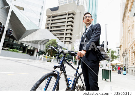 Young businessmen with a bike 33865313