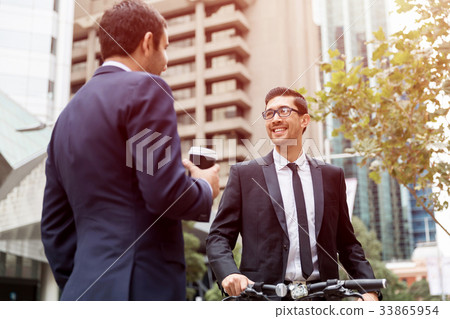 Two businessmen talking outdoors 33865954