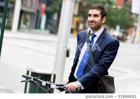 Young businessmen with a bike 33866681