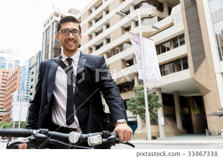 Young businessmen with a bike 33867338