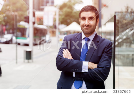 Portrait of handsome businessman outdoor Portrait of handsome businessman outdoor 33867665