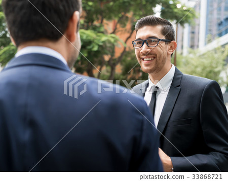 Two businessmen talking outdoors 33868721