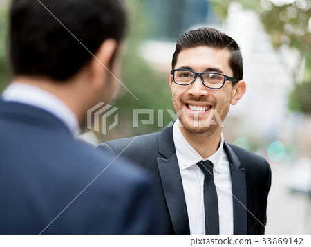 Portrait of handsome businessman outdoor 33869142