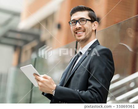 Portrait of handsome businessman outdoor Portrait of handsome businessman outdoor 33869361