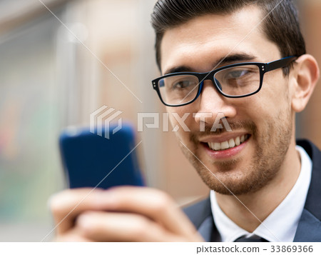 Portrait of handsome businessman outdoor Portrait of handsome businessman outdoor 33869366