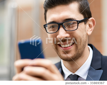 Portrait of handsome businessman outdoor Portrait of handsome businessman outdoor 33869367