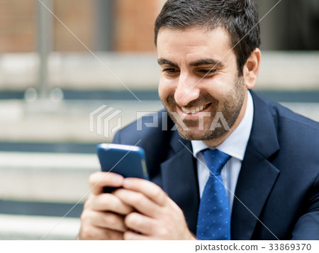 Portrait of handsome businessman outdoor Portrait of handsome businessman outdoor 33869370