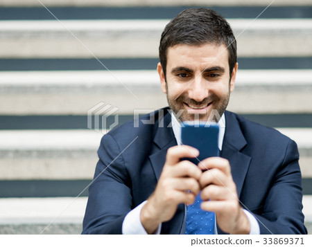 Portrait of handsome businessman outdoor Portrait of handsome businessman outdoor 33869371