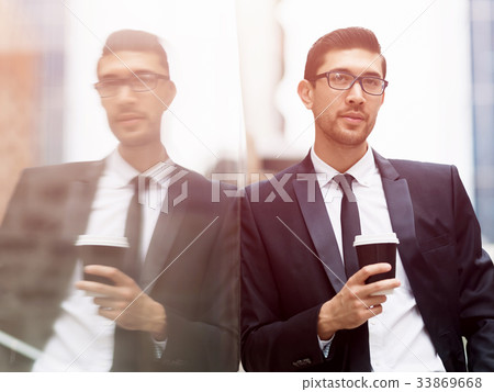 Portrait of handsome businessman outdoor Portrait of handsome businessman outdoor 33869668