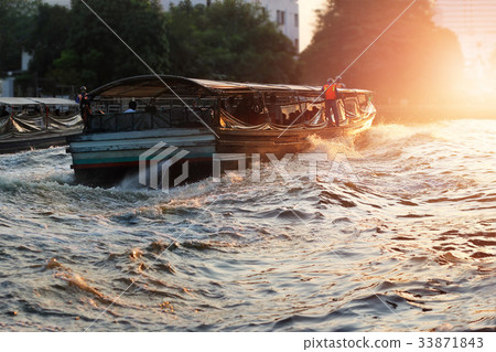 transportation taxi boat in river city on sunset transportation taxi boat in river city on sunset 33871843
