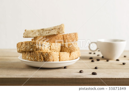 bread with white sesame, coffee beans, coffee cup bread with white sesame, coffee beans, coffee cup 33871849