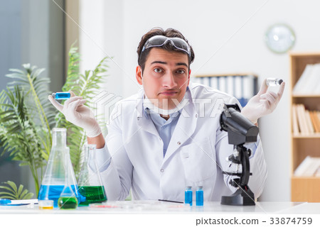 Male doctor working in the lab on virus vaccine 33874759