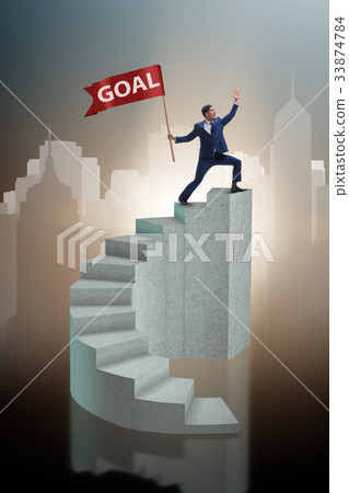 Businessman achieving his business goal objective Businessman achieving his business goal objective 33874784