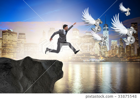 Businessman chasing angel dollars in business Businessman chasing angel dollars in business 33875548