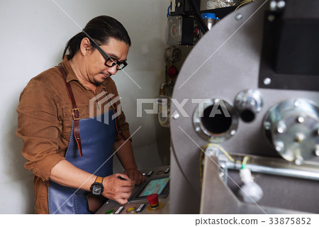 Working at coffee roastery 33875852