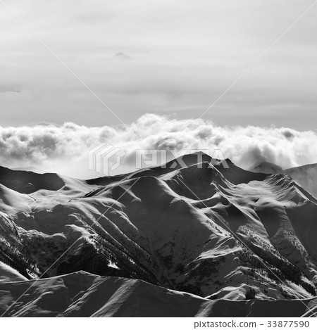 Black and white of evening snow mountain at winter Black and white of evening snow mountain at winter 33877590