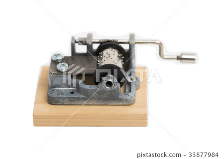 Old metal barrel organ on isolated background. 33877984