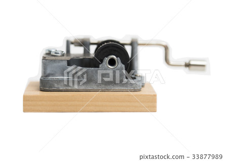 Old metal barrel organ on isolated background. 33877989