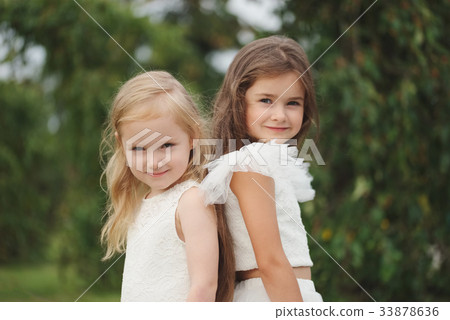 beautiful girl in white dress 33878636