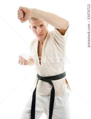 Karate. Man in a kimono Karate. Man in a kimono 33878722