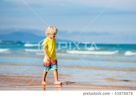 Child on tropical beach. Sea vacation with kids. Child on tropical beach. Sea vacation with kids. 33878878