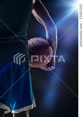 The portrait of a basketball player with ball 33883262