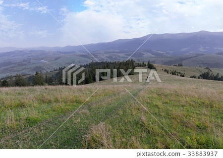 Beautiful scenery of the Carpathians and the road Beautiful scenery of the Carpathians and the road 33883937
