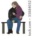 Young loving couple kissing on park bench 33884032