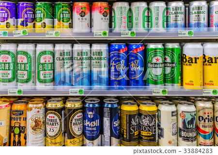 Variety of beers in a 7-eleven convenience store 33884283