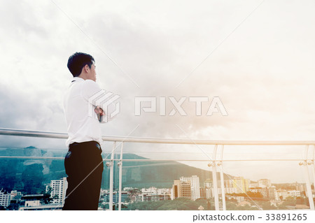 Back view of success Business man looking view 33891265