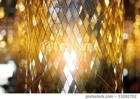 Shining golden mosaic glass background 33892702