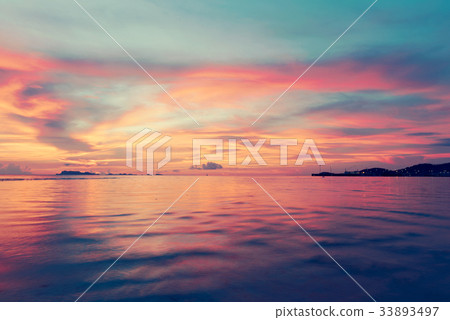 Sunset dramatic colorful tropical sea sky  33893497