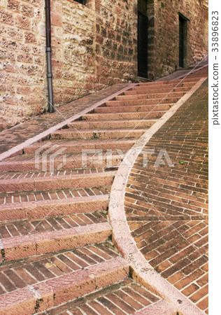 Narrow staircase street of Assisi, Italy 33896823