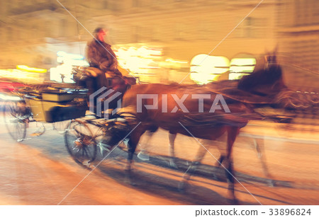 Horse carriage is running onthe street of Vienna Horse carriage is running onthe street of Vienna 33896824
