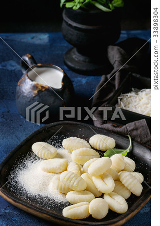Raw uncooked potato gnocchi Raw uncooked potato gnocchi 33898304