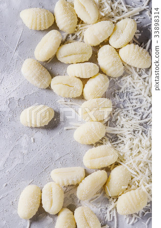 Raw uncooked potato gnocchi Raw uncooked potato gnocchi 33898314