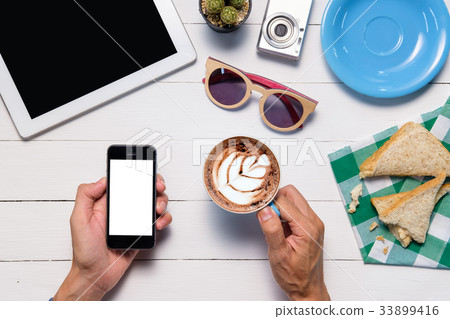 Man using smart phone Man using smart phone 33899416