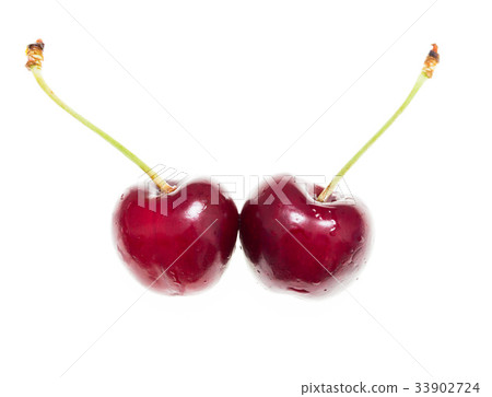 Juicy red cherry on a white background Juicy red cherry on a white background 33902724