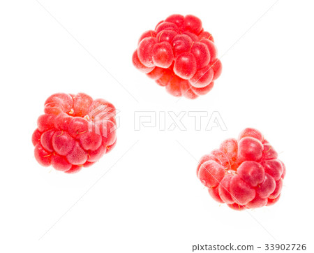 Juicy red raspberries on white background Juicy red raspberries on white background 33902726