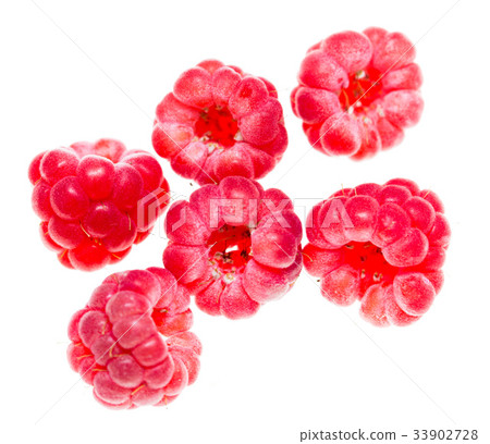 Juicy red raspberries on white background Juicy red raspberries on white background 33902728