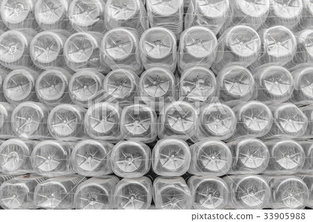 Stack of bottom plastic bottles texture 33905988